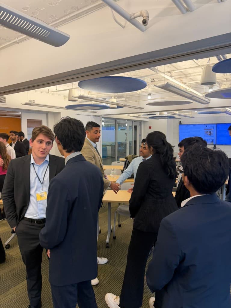 Attendees networking between BoilerLaunch sessions